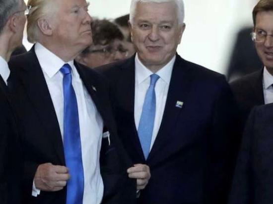 Trump after pushing aside Montenegro Prime Minister Dusko Markovic at NATO meeting, May 25, 2017