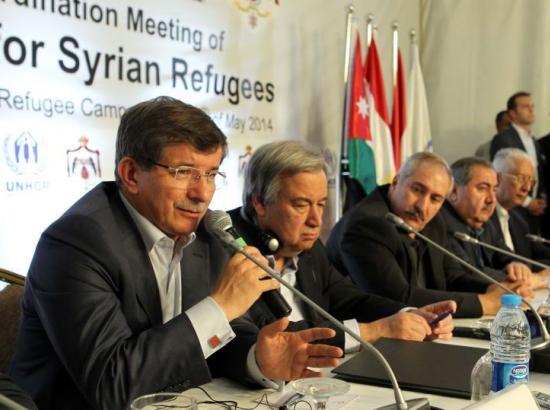 Ahmet Davutoğlu at the third “Ministerial Meeting of Syria-Bordering Countries” — Zaatari Refugee Camp in Jordan, May 4, 2014.