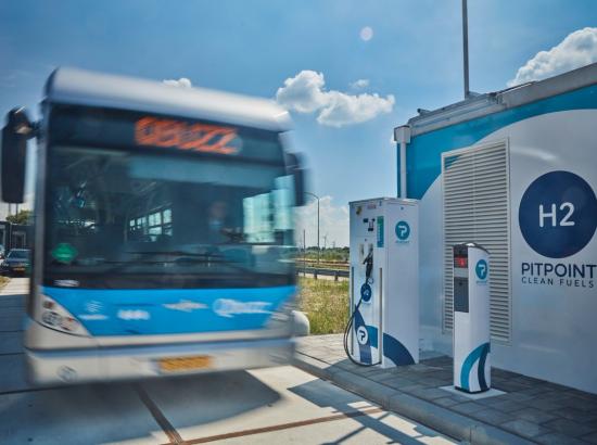 hydrogen-powered public bus pulls into filling station