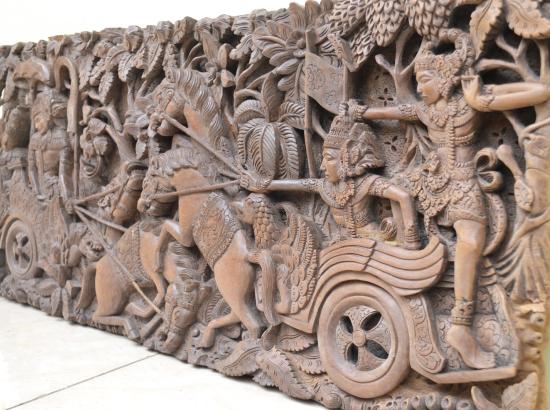 carved wooden panel depicting scene of the Mahabharata