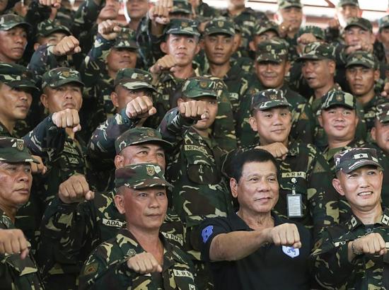 Duterte and military officers give 'fist' salute