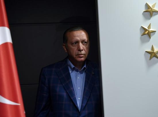 Turkish president Recep Tayyip Erdoğan arrives to deliver a speech at Justice and Development Party (AKP) headquarters in Istanbul in 2017. Photo credit: AFP/Bulent Kilic