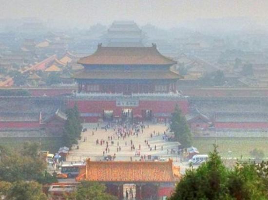 smog fills the skyline above the gates to the Forbidden City, Beijing
