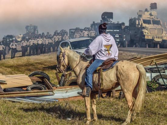 Standing Rock Sioux protest against Dakota Access oil pipeline, 2016. Photo by Ryan Vizzions.