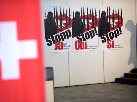 posters from 2009 Swiss referendum to ban construction of minarets on mosques