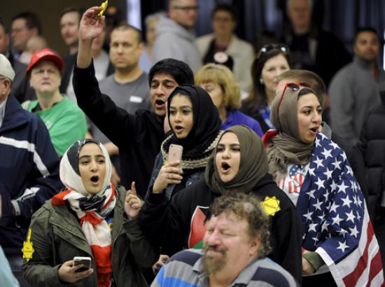 Young Muslims protest at Kansas Republican Caucus in Wichita, Kansas, on March 5, 2016. Photo by Dave Kaup/Reuters
