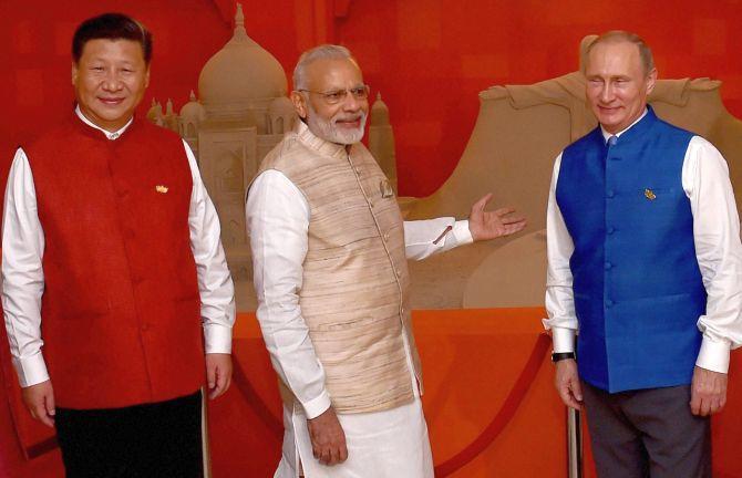 Xi, Modi, Putin at trilateral meeting at 2018 G20 meeting in Buenos Aires.