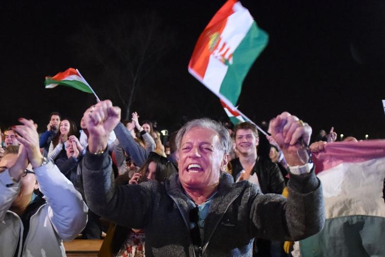 Fidesz supporters react as Prime Minister Viktor Orbán wins Hungarian parliamentary election