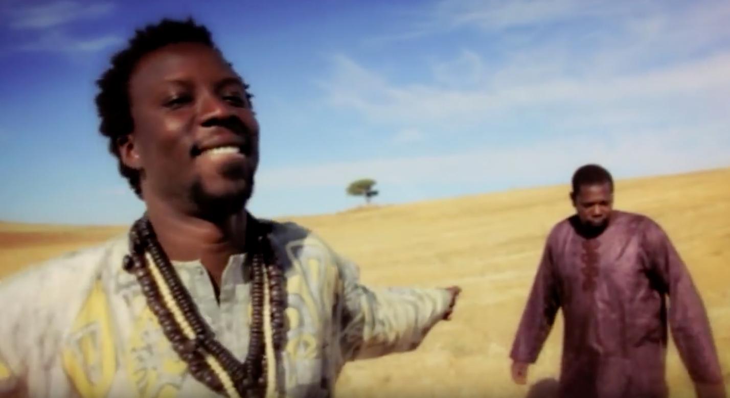 screenshot of video for the song 'Satati' by Momar Gaye and band Zaman, shot in Sardinia