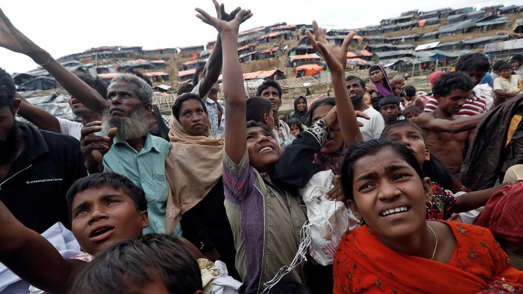 aid distribution at Rohingya camp, Cox's Bazar, Bangladesh - September 18, 2017