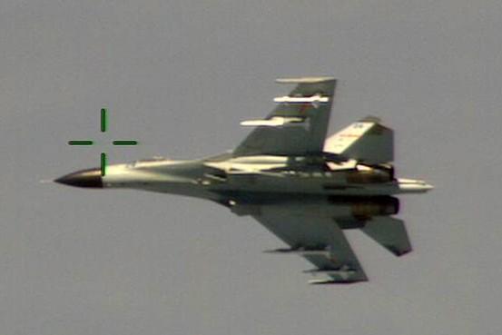 Chinese jet fighter intercepts at close range a US surveillance plane off coast of China