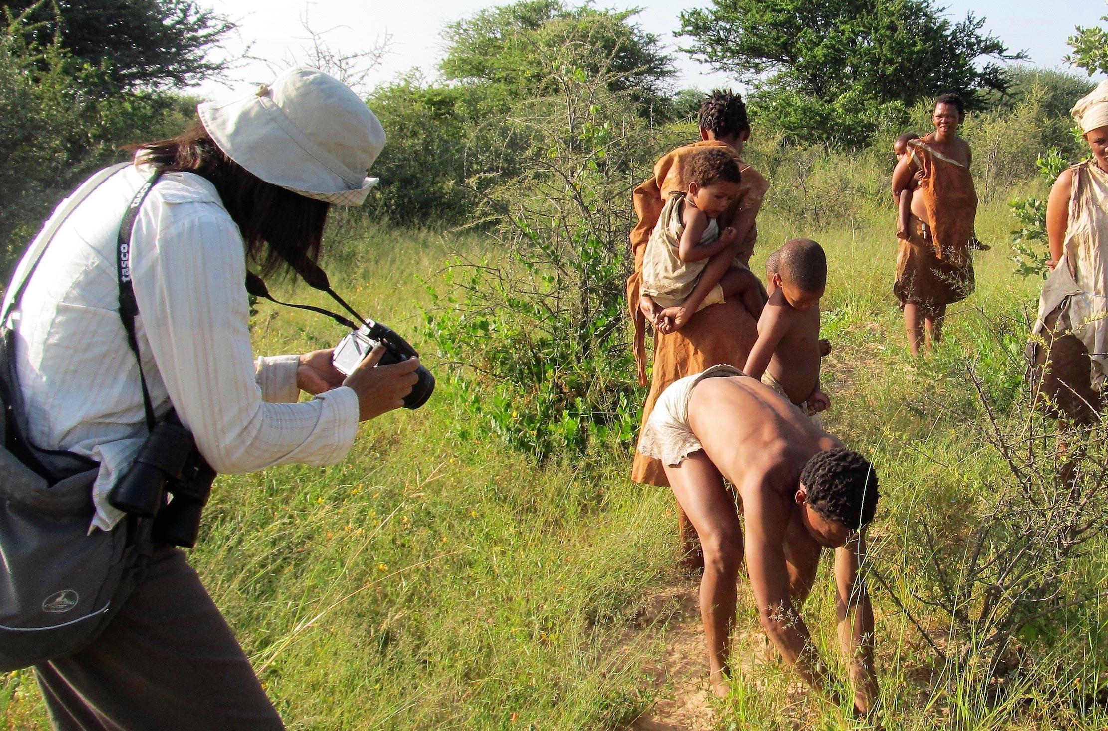 tourist enjoys 'Bushman tourism' in Botswana. Photo credit: Junko Maruyama