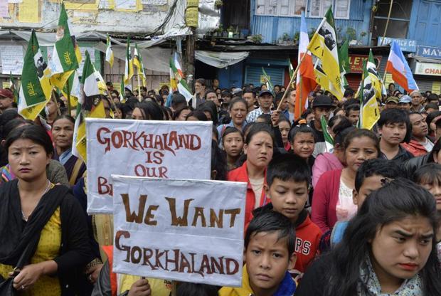 Supporters of the Gorkha Janmukti Morcha protest amid an indefinite strike called by the GJM in Darjeeling on 5 July. Photo: AFP