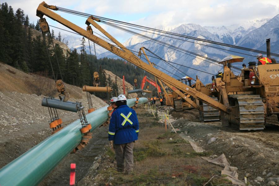 machinery laying pipeline in the Canadian Rocky Mountains