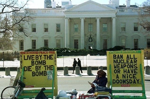 "live by the bomb - die by the bomb" - White House protest sign