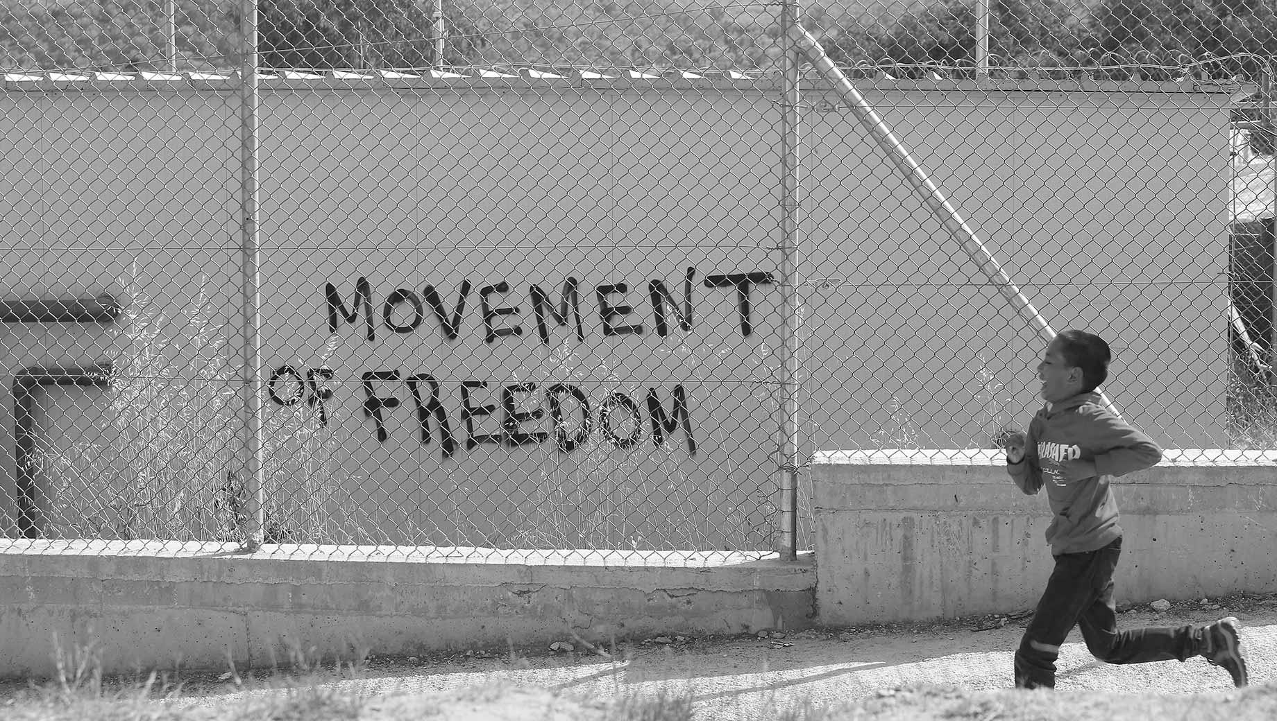 wall graffiti reads 'Movement of Freedom'