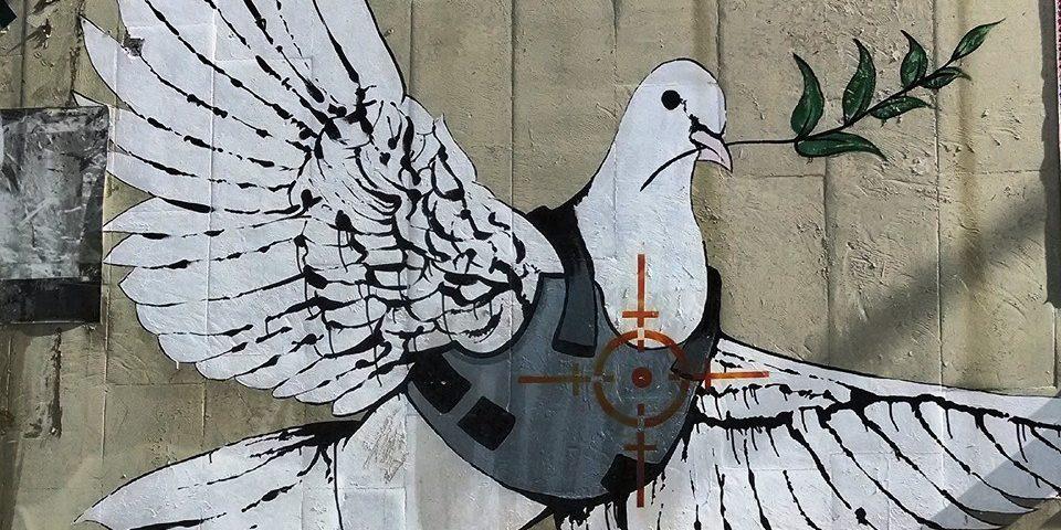 Bansky mural painting in Bethlehem — Armored Dove of Peace