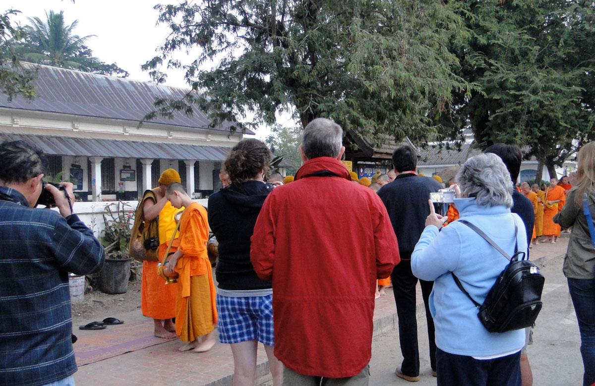 tourists with monks
