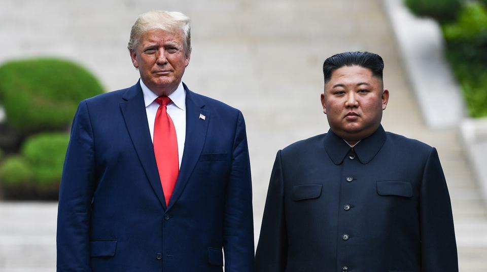Donald Trump with North Korean President Kim Jong Un in the Joint Security Area of Panmunjom in the Demilitarized Zone (DMZ) on June 30, 2019