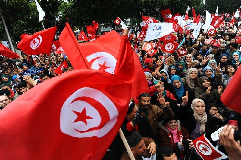 Tunesians celebrate the third anniversary of the uprising that ousted longtime dictator Zine El Abidine Ben Ali