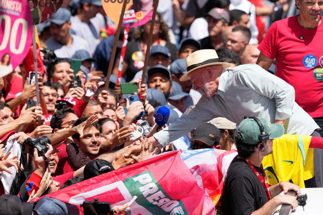 President Luiz Inacio Lula da Silva, who is running for reelection, greets supporters during a campaign rally a day ahead of the country's general election in Sao Paulo, Saturday, Oct. 3, 2026. (AP Photo/Andre Penner) | AP