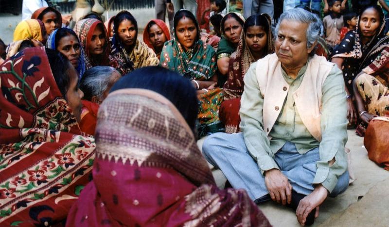 Grameen Bank founder Muhammad Yunus meets with women in Dhaka, Bangladesh