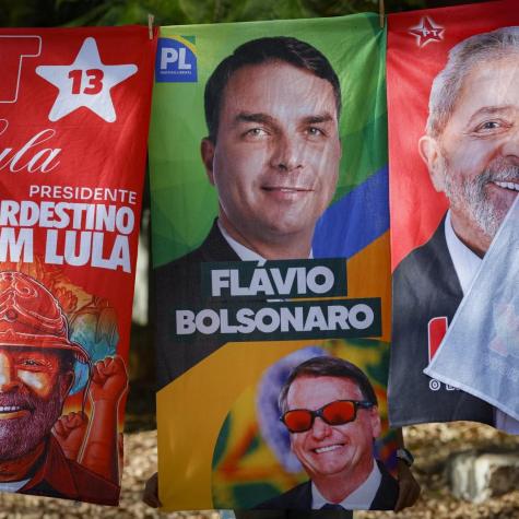 Towels and caps for sale depicting Brazilian presidential candidates Luiz Inacio Lula da Silva and Flavio Bolsonaro are seen in a residential area of Brasília on September 11, 2026. Brazil will hold a presidential elections on October 4, 2026. Sergio Lima/AFP via Getty Images