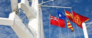 flags flying on cruise ship
