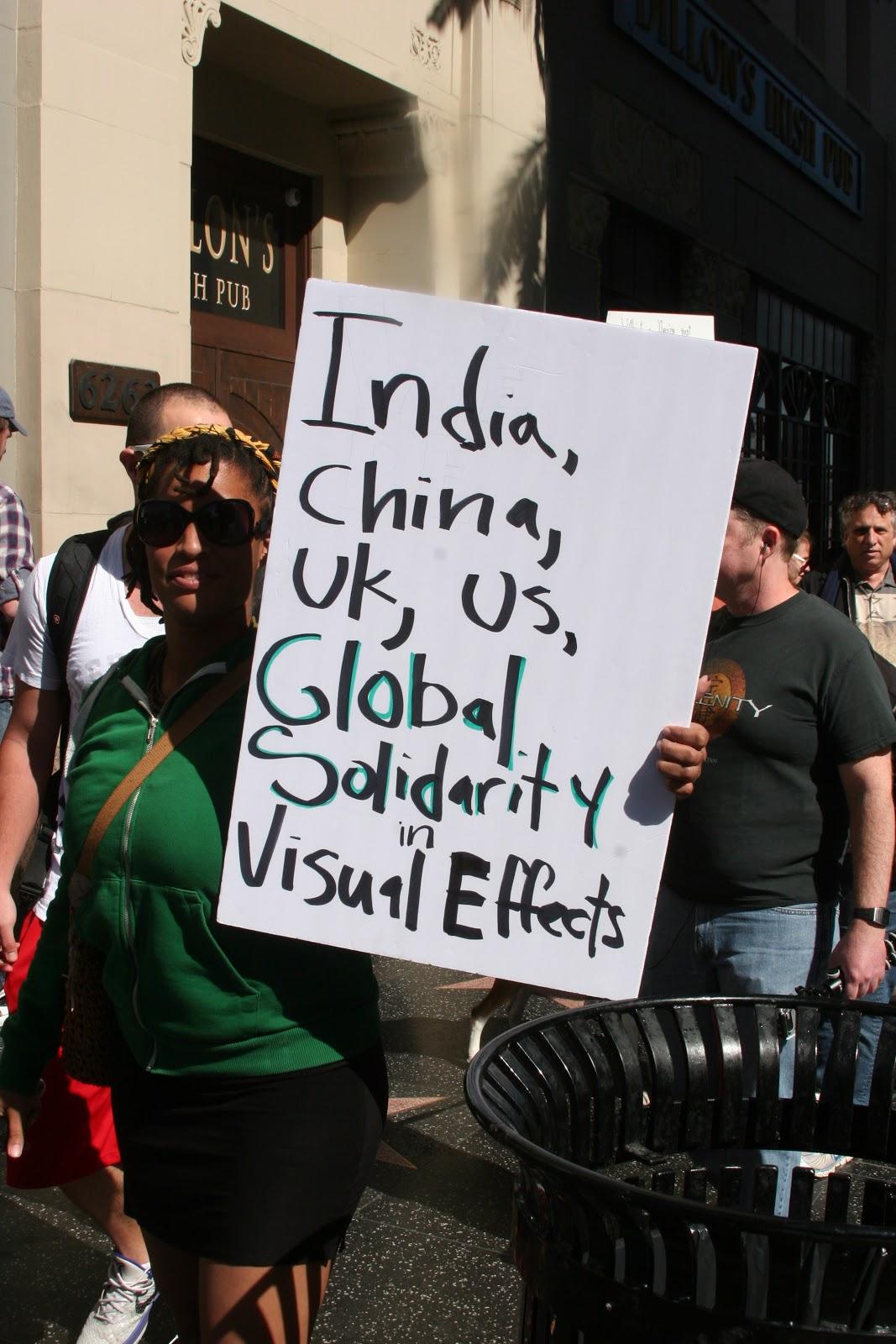protest sign expressing global solidarity among VFX workers