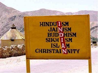 sign listing 5 religions with highlighted letters forming the word 'Indian'