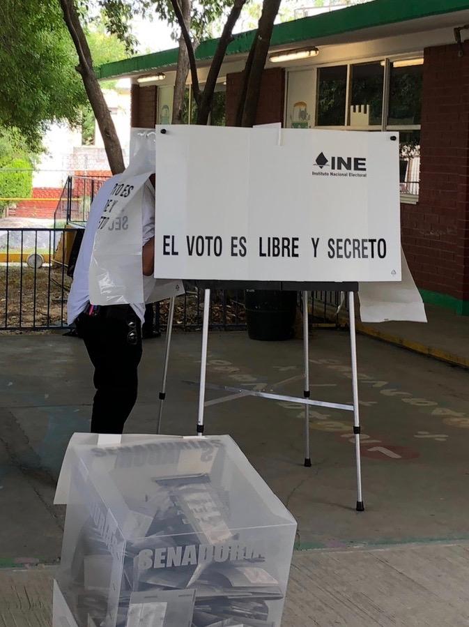 voter at voting station in Mexico, 2018. Photo credit: Alison Brysk