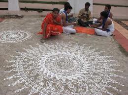 women and men seated before jhoti painting