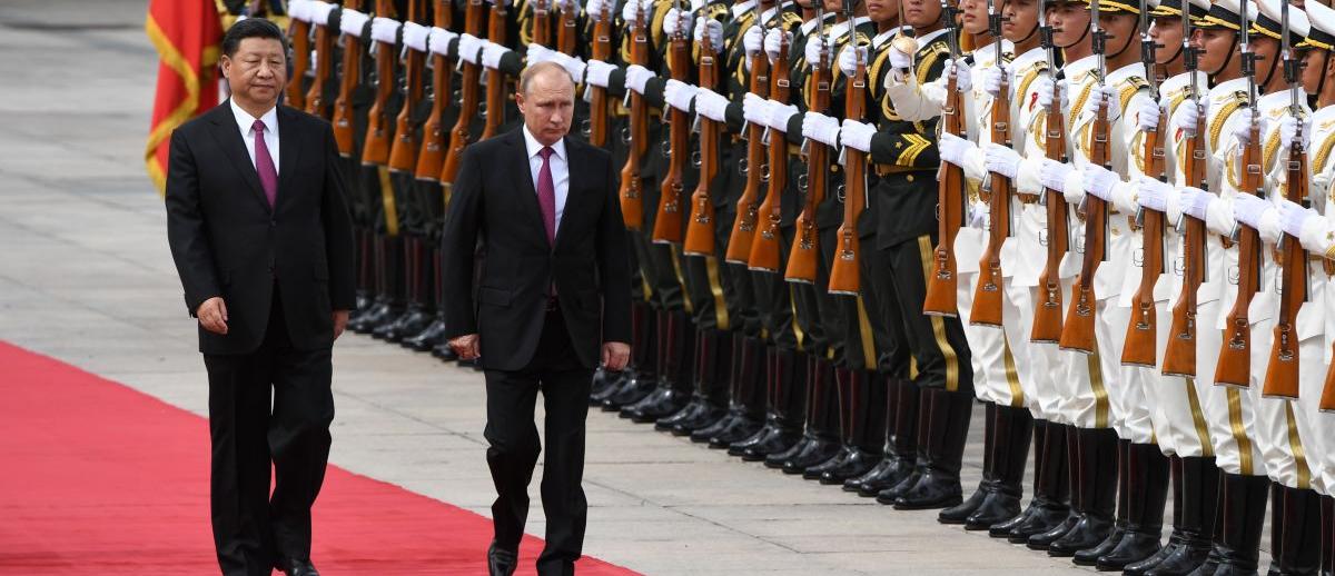 Xi Jinping and Vladimir Putin attend a welcome ceremony in Beijing, China. June 8, 2018