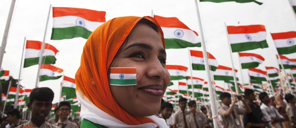 indian women surrounded by indian flags