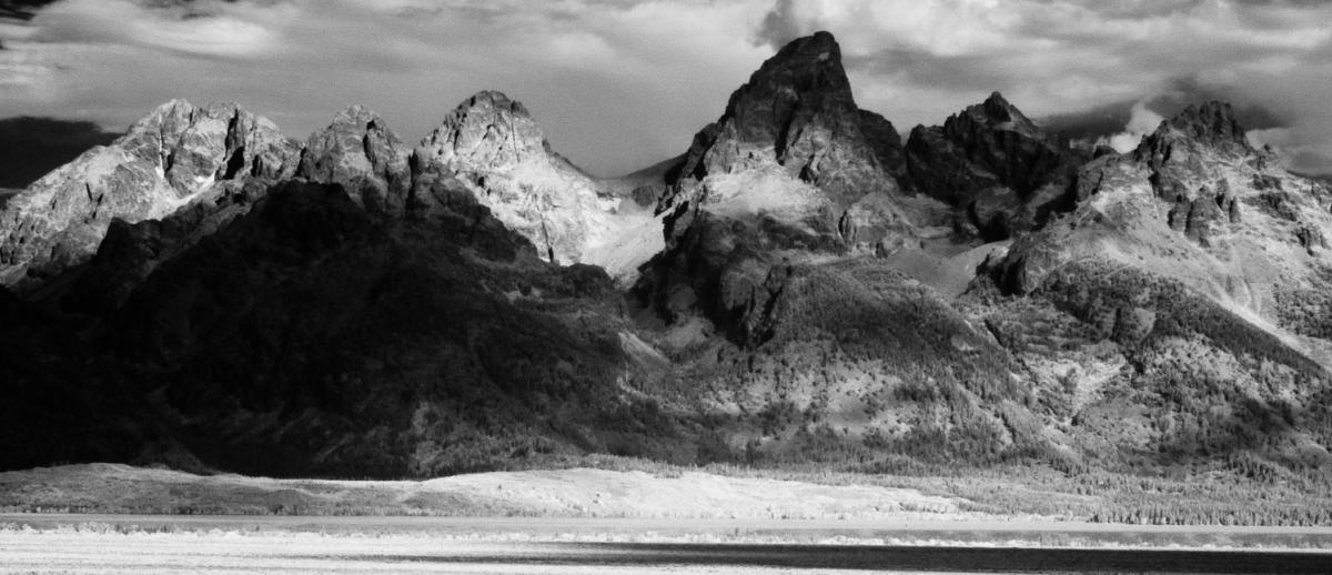 a mountain with clouds