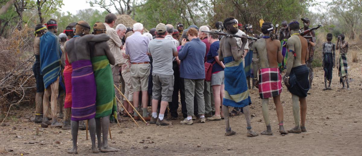 visitors in a Mursi tourist village