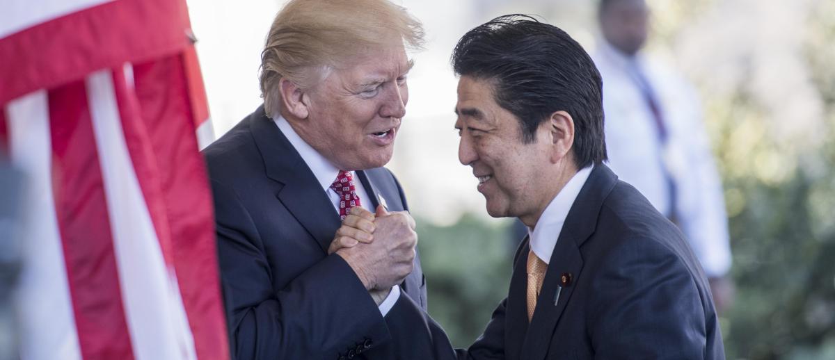 Japanese Prime Minister Shinzo Abe greeted by President Donald Trump at the White House in February 2017.