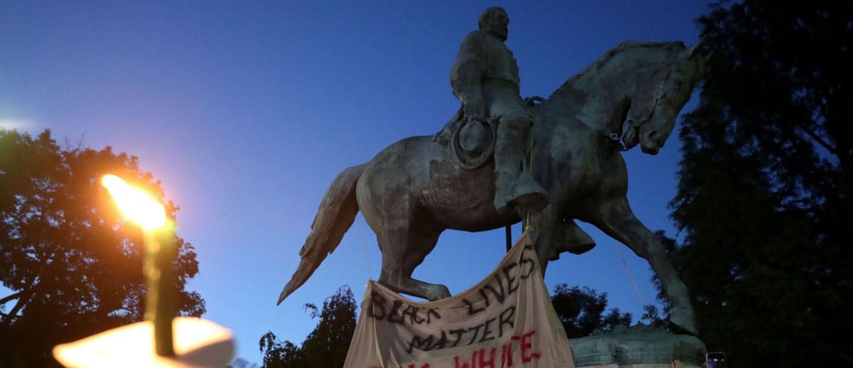Black Lives Matter banner hung over statue of Robert E. Lee, Charlottesville, Virginia -- May 14, 2017.