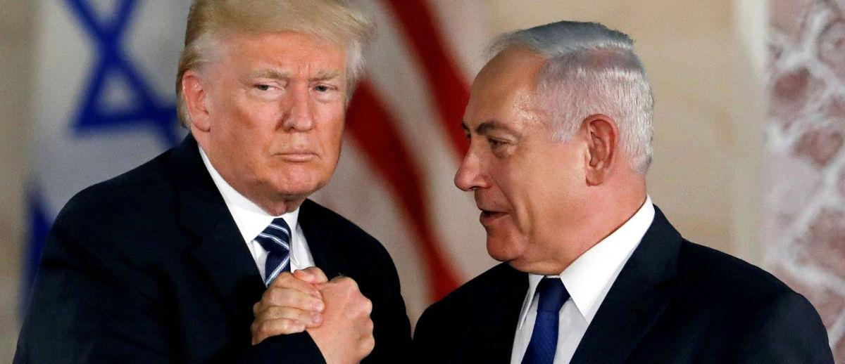 Donald Trump and Benjamin Netanyahu in 'soul brother' handshake