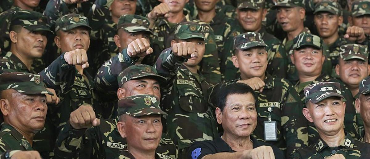 Duterte and military officers give 'fist' salute