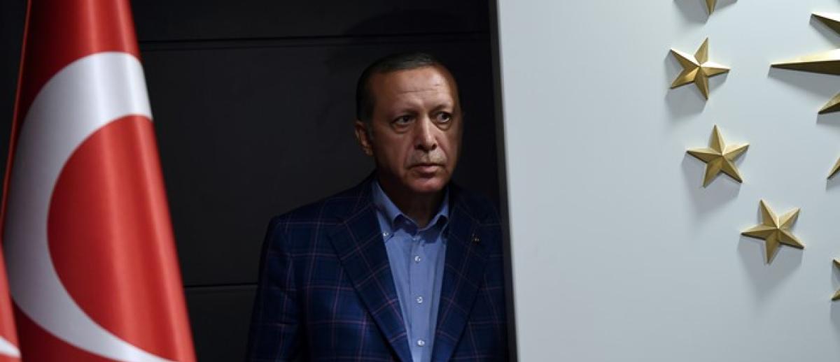 Turkish president Recep Tayyip Erdoğan arrives to deliver a speech at Justice and Development Party (AKP) headquarters in Istanbul in 2017. Photo credit: AFP/Bulent Kilic