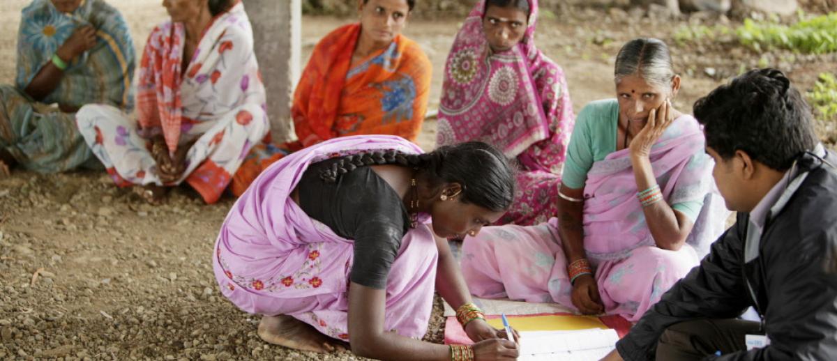 women participate in self-help group, India