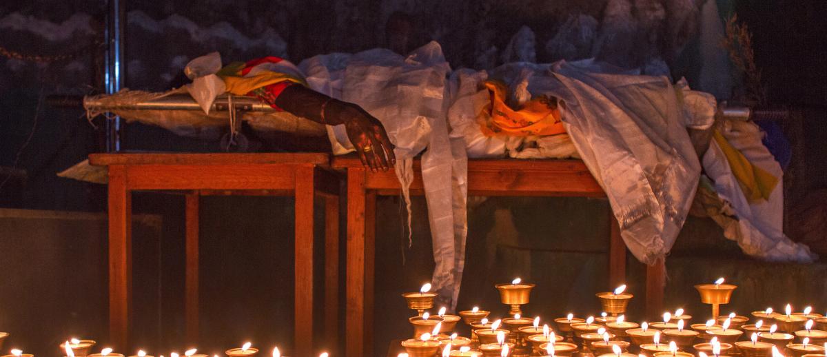 4 November protestor simulates self-immolator at Martyr’s Memorial, Tsuglagkhang Temple, McLeod Ganj, India in 2012