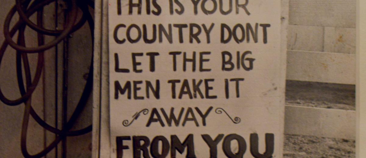 hand-drawn poster: "This is Your Country Don't Let the Big Men Take it Away from You"