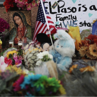 flowers at impromptu shrine for El Paso shooting victims