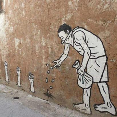“The Sprouting of Revolutionary Fists” - mural by Zoo Project, Tunis, Tunisia, March-April 2011.