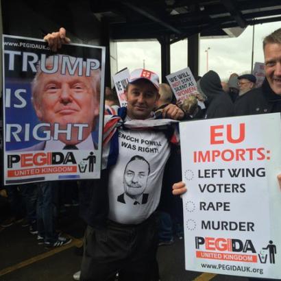 PEGIDA supporters hold up 'Trump is Right' sign at march