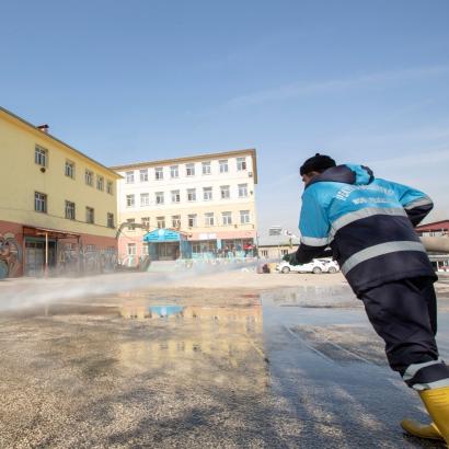 A worker disinfects a school in the Ipekyolu district of Turkey's eastern Van province