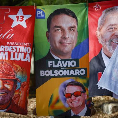 Towels and caps for sale depicting Brazilian presidential candidates Luiz Inacio Lula da Silva and Flavio Bolsonaro are seen in a residential area of Brasília on September 11, 2026. Brazil will hold a presidential elections on October 4, 2026. Sergio Lima/AFP via Getty Images